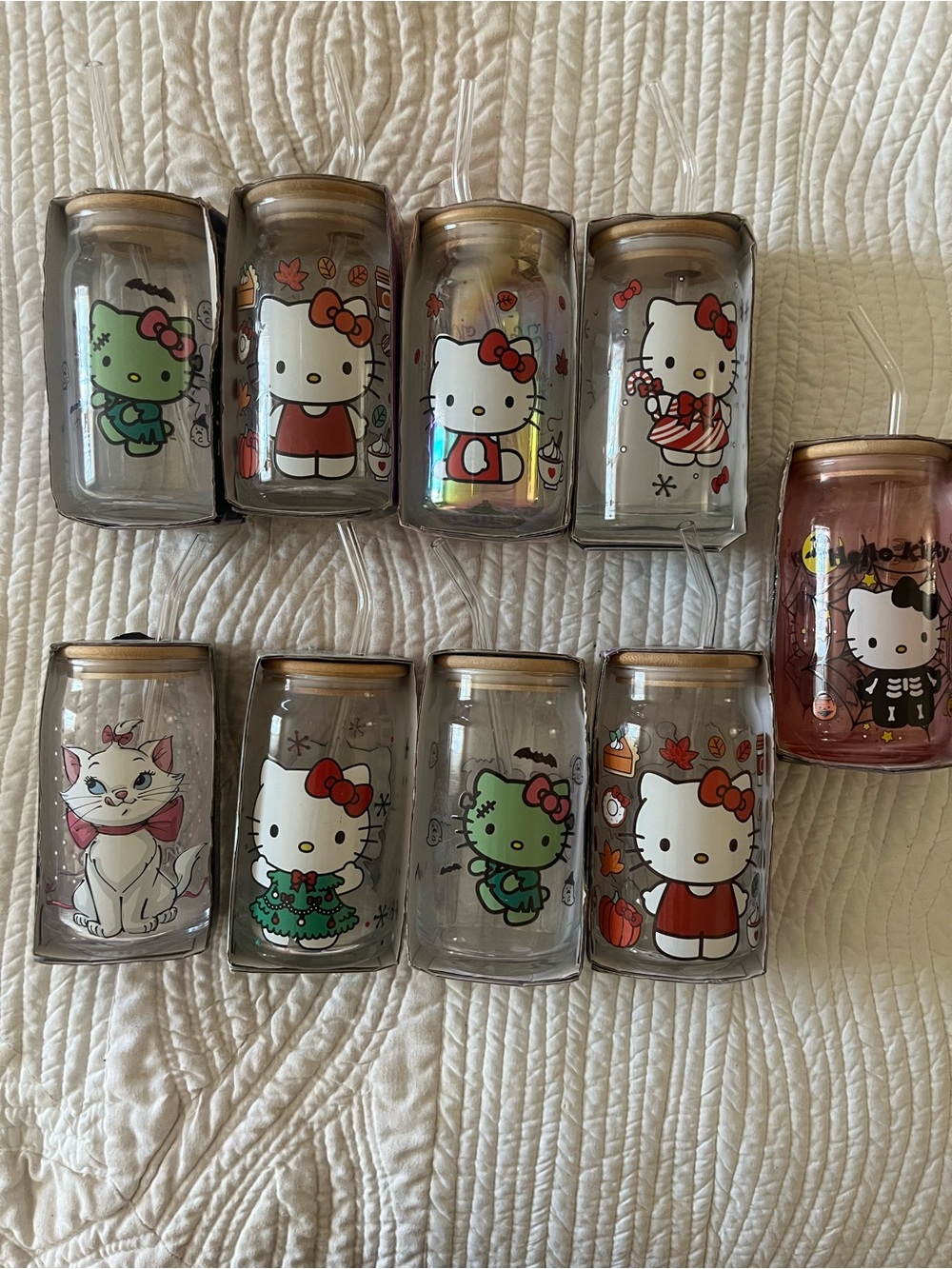 Hello Kitty Clear Glass Can Tumblers with Fall and Holiday Themes.
